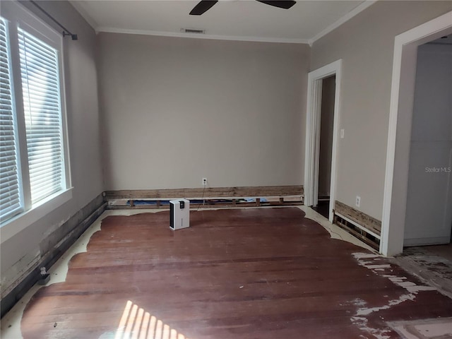 unfurnished room featuring ceiling fan, crown molding, and a healthy amount of sunlight