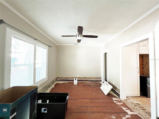 14124 Plum Ln, Hudson, FL 34667 - empty room featuring a textured ceiling, crown molding, wood finished floors, and a ceiling fan