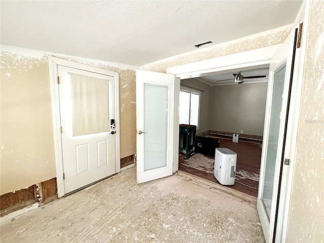 14124 Plum Ln, Hudson, FL 34667 - entryway featuring a textured ceiling