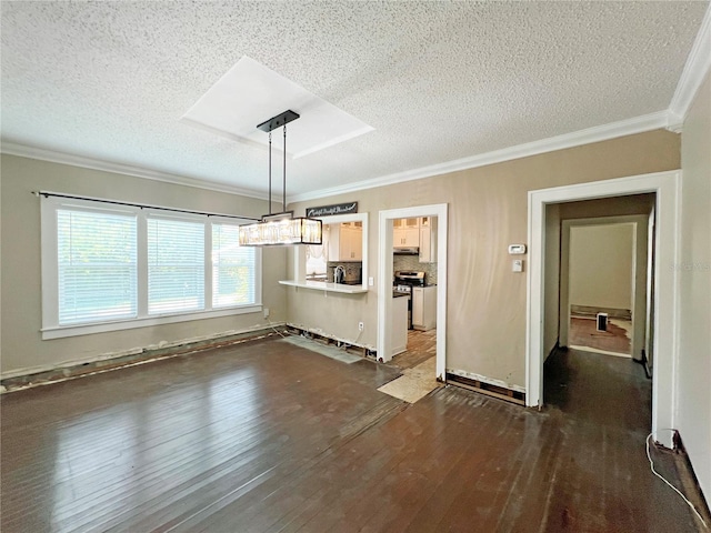14124 Plum Ln, Hudson, FL 34667 - unfurnished dining area featuring dark wood finished floors, a textured ceiling, and crown molding