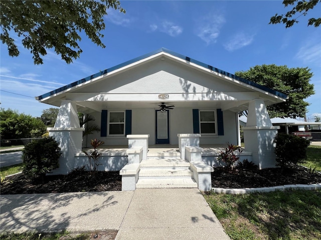 14124 Plum Ln, Hudson, FL 34667 - bungalow-style house with covered porch