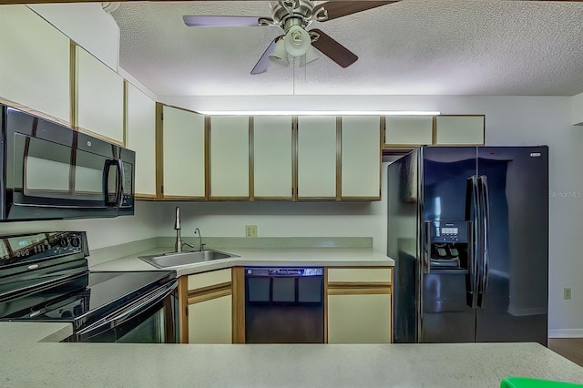 kitchen with ceiling fan, sink, a textured ceiling, and black appliances