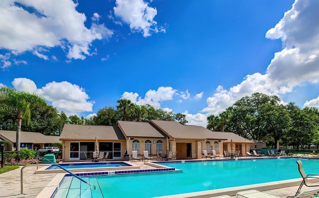 view of pool featuring a patio