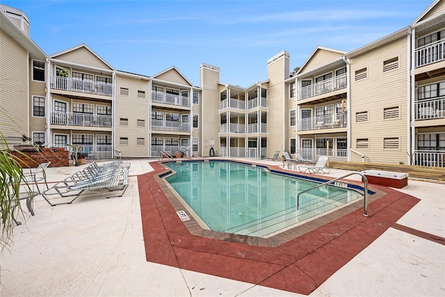 view of pool featuring a patio area