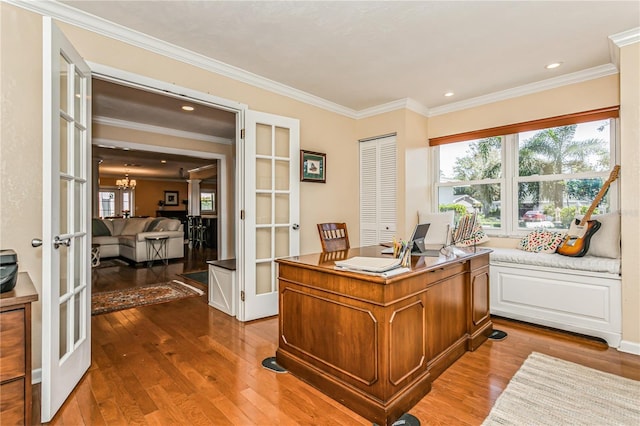 office featuring french doors, crown molding, recessed lighting, a chandelier, and hardwood / wood-style flooring