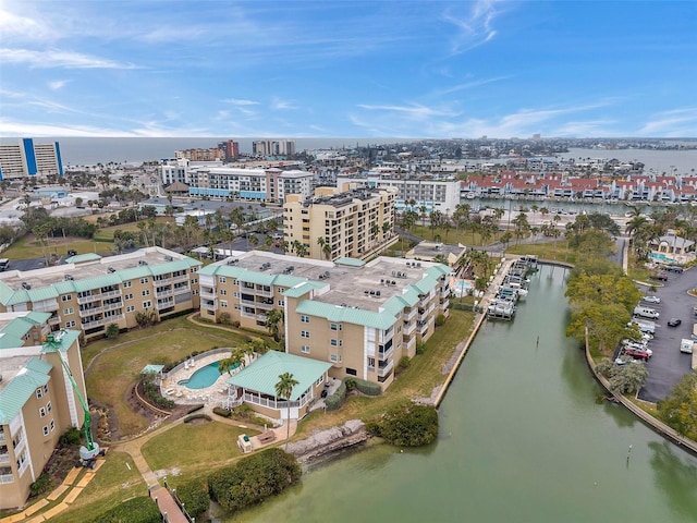 drone / aerial view featuring a water view and a city view