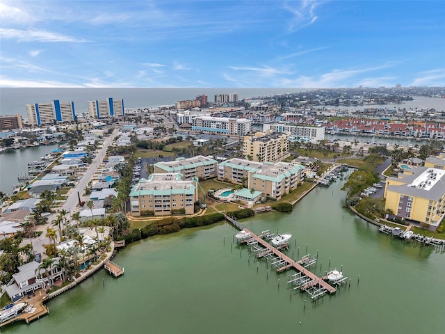 drone / aerial view featuring a water view and a city view