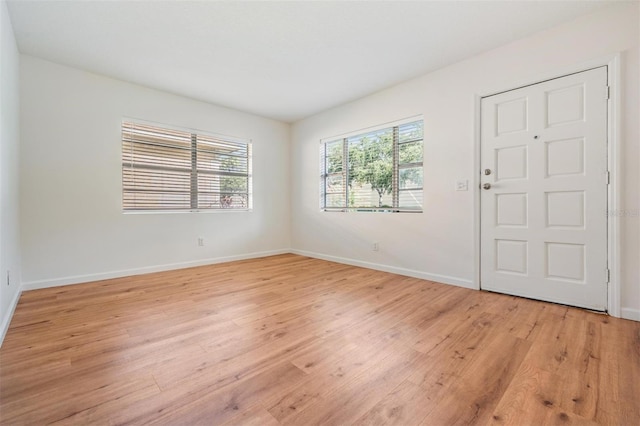 empty room featuring light hardwood / wood-style floors