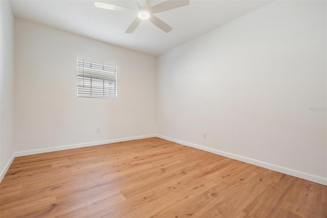 empty room with ceiling fan and light wood-type flooring