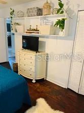 bedroom featuring hardwood / wood-style floors