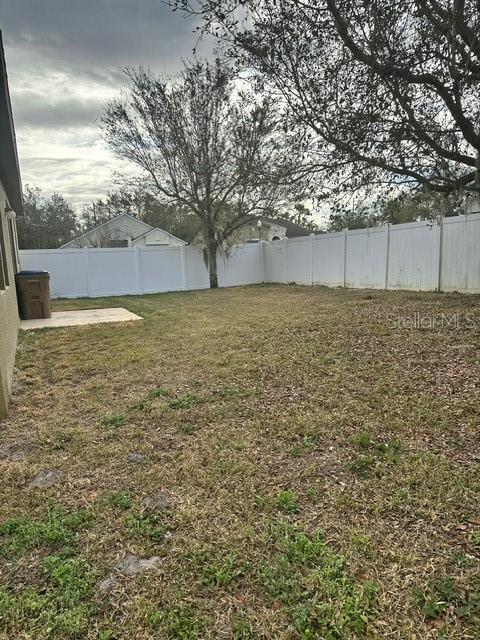 view of yard featuring a fenced backyard