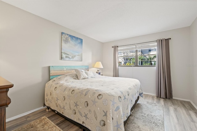 bedroom featuring hardwood / wood-style flooring