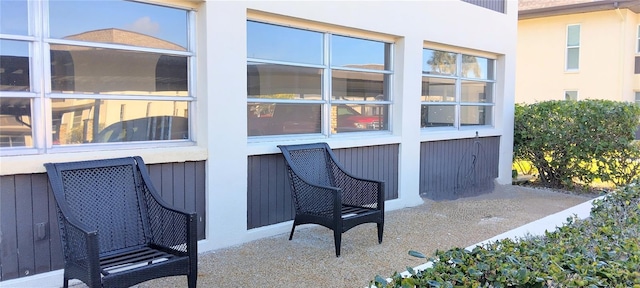 view of side of property featuring a patio area