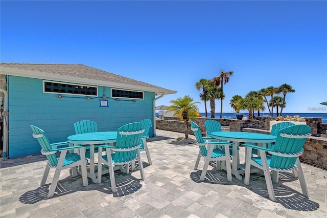 view of patio / terrace with a water view