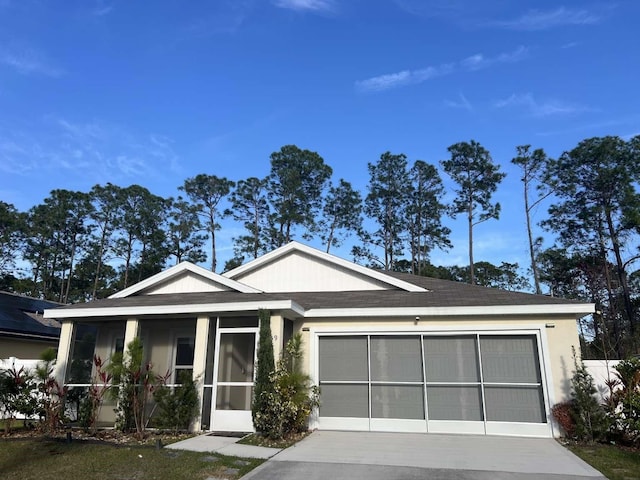 view of front of property with a garage