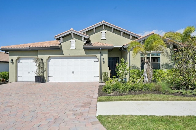 view of front of property with a garage