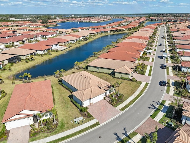 drone / aerial view with a water view