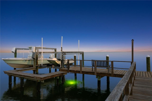 view of dock with a water view