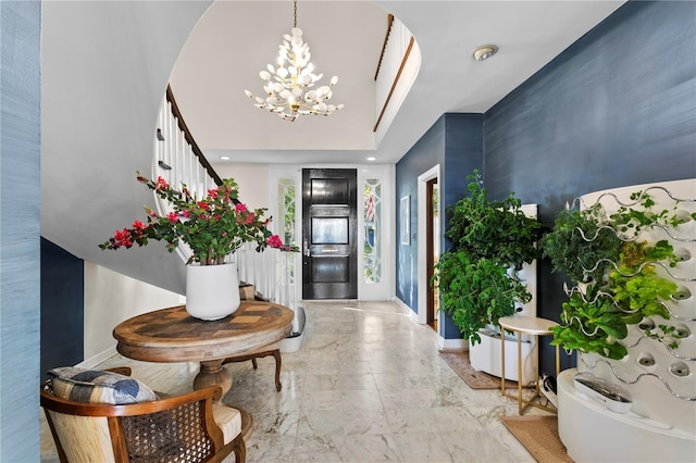 foyer entrance featuring a chandelier