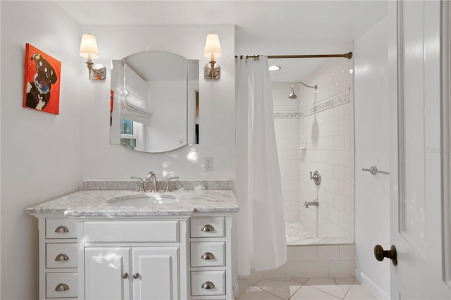 bathroom with tile patterned flooring, vanity, and a shower with shower curtain