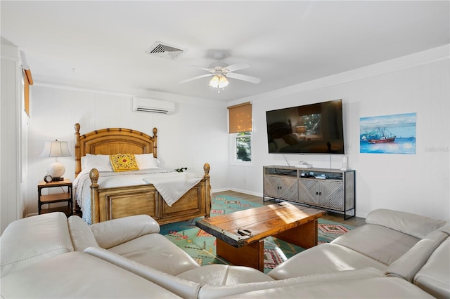 bedroom featuring hardwood / wood-style flooring, crown molding, ceiling fan, and a wall unit AC