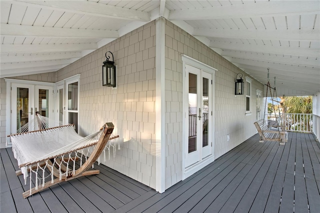 wooden deck featuring french doors