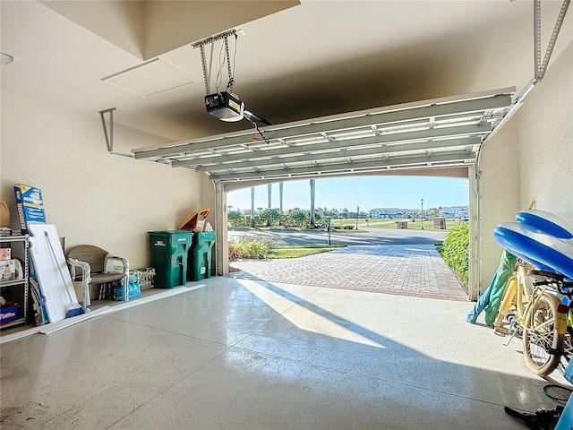 garage featuring a garage door opener