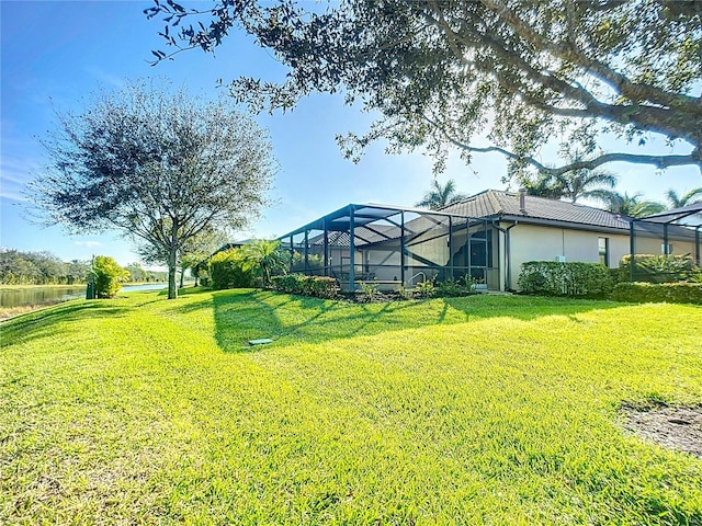 view of yard with a lanai