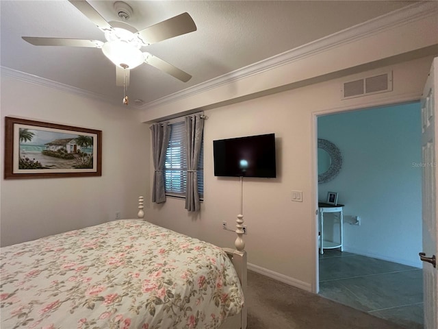 carpeted bedroom featuring ceiling fan and ornamental molding