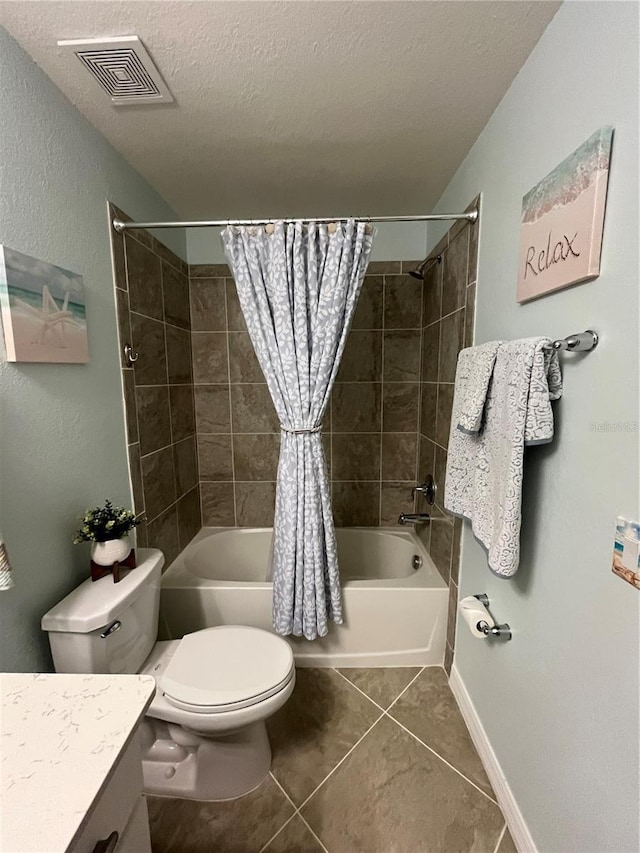 full bathroom featuring tile patterned flooring, vanity, shower / bath combination with curtain, a textured ceiling, and toilet