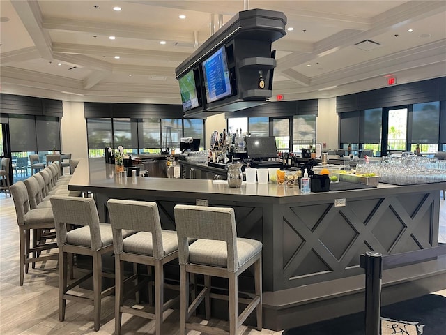 bar featuring coffered ceiling, beamed ceiling, and light wood-type flooring