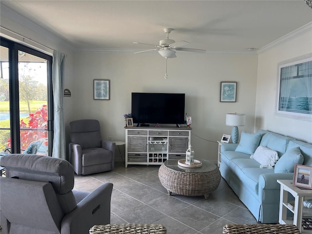 tiled living area with ceiling fan and ornamental molding