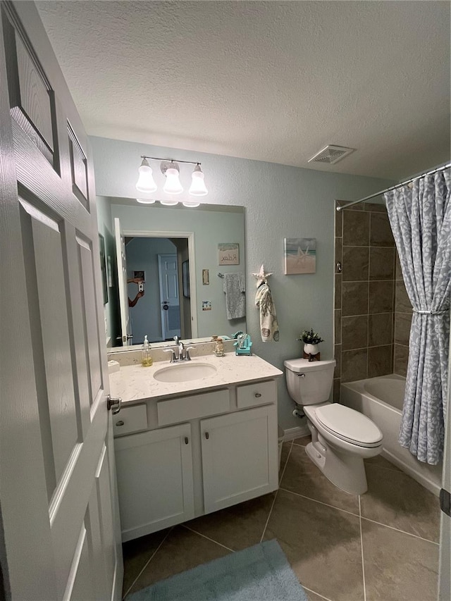 bathroom featuring shower / bathtub combination with curtain, a textured ceiling, and tile patterned floors