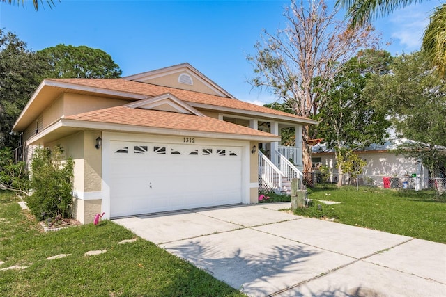 view of front facade featuring a garage and a front yard