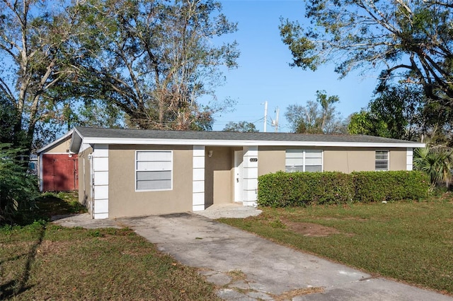 single story home with a front yard