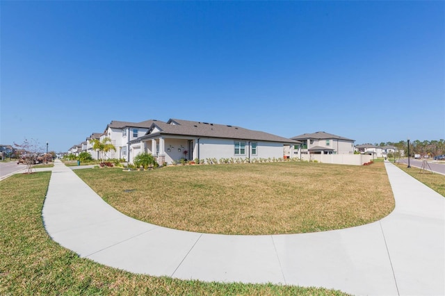 exterior space with a front lawn