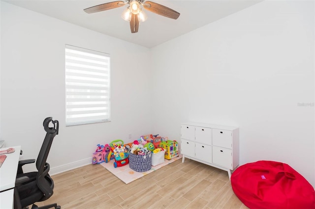 office featuring ceiling fan and light hardwood / wood-style floors