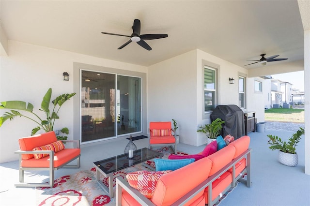 view of patio / terrace with area for grilling, an outdoor hangout area, and ceiling fan