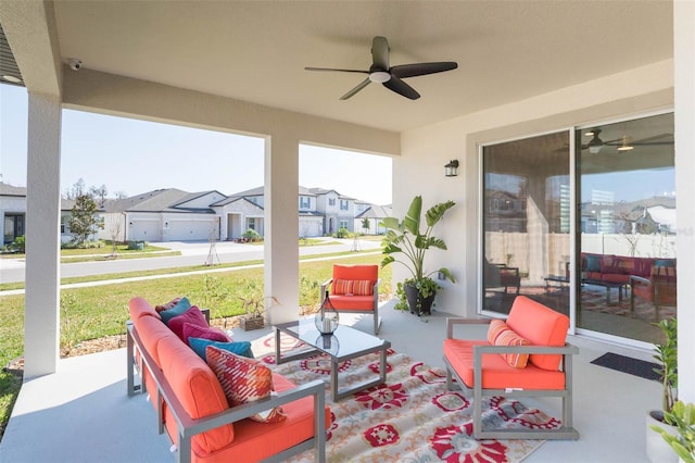 view of patio / terrace featuring an outdoor living space and ceiling fan