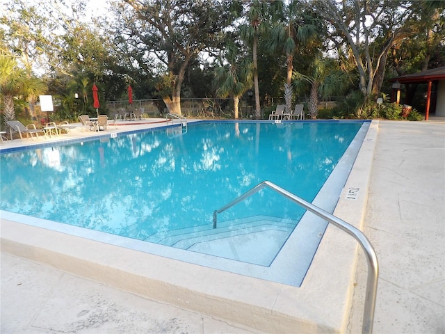 2623 Seville Blvd Unit 111, Clearwater, FL 33764 - community pool featuring a patio