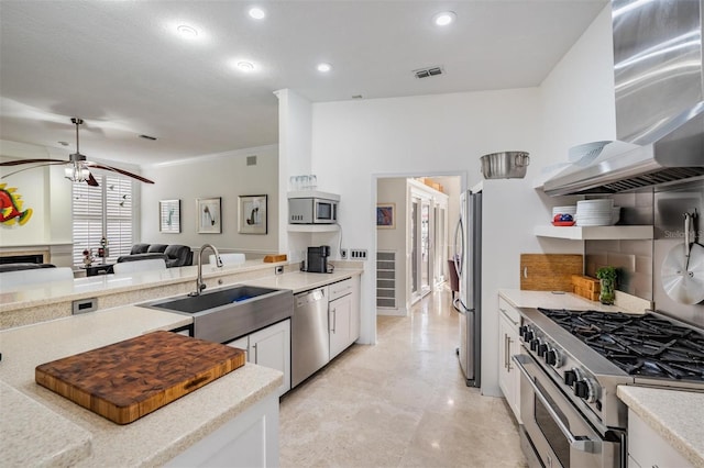 kitchen with appliances with stainless steel finishes, sink, white cabinets, decorative backsplash, and exhaust hood