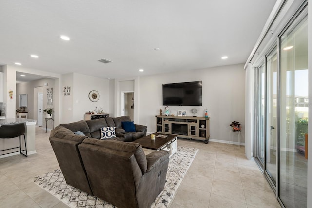 living room with light tile patterned floors