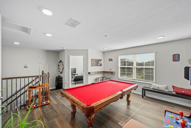 recreation room with hardwood / wood-style flooring, billiards, and a textured ceiling