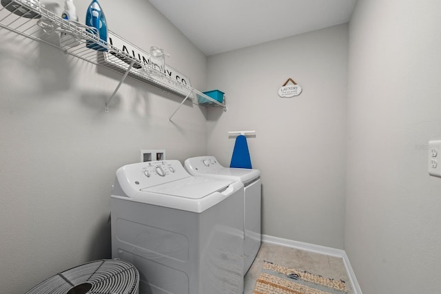 laundry room featuring washing machine and dryer