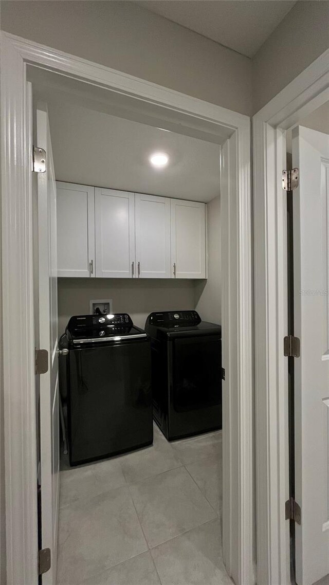 10854 Sage Canyon Dr, Riverview, FL 33578 - laundry area with cabinet space and independent washer and dryer