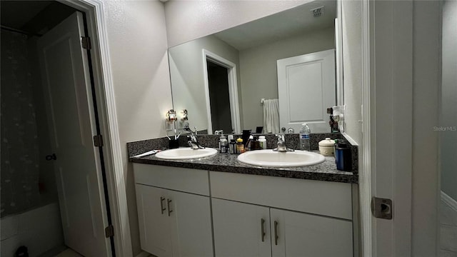 10854 Sage Canyon Dr, Riverview, FL 33578 - full bathroom featuring double vanity, visible vents, and a sink