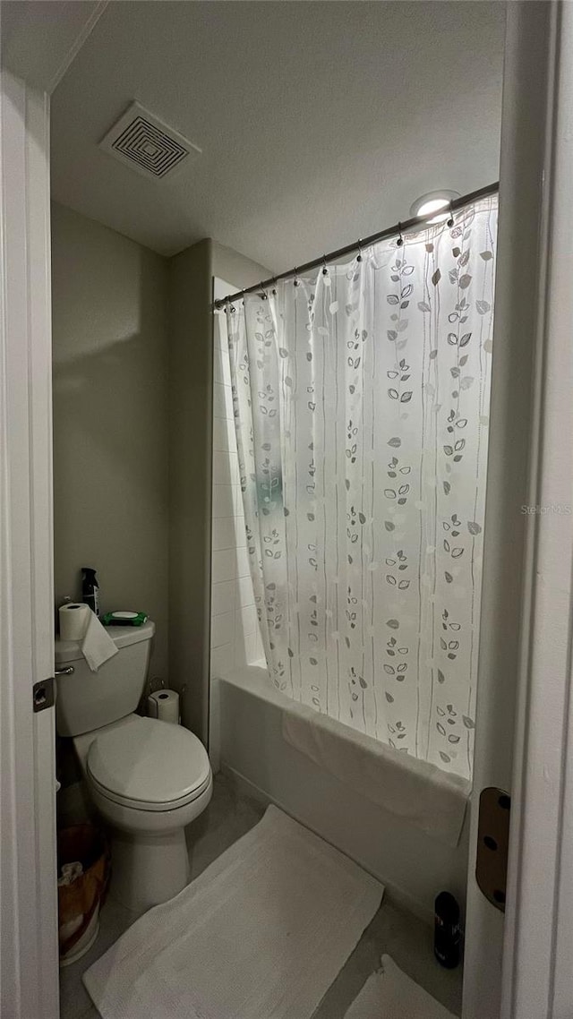 10854 Sage Canyon Dr, Riverview, FL 33578 - bathroom featuring shower / tub combo, visible vents, and toilet