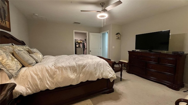 10854 Sage Canyon Dr, Riverview, FL 33578 - bedroom featuring a closet, visible vents, a spacious closet, a ceiling fan, and light carpet