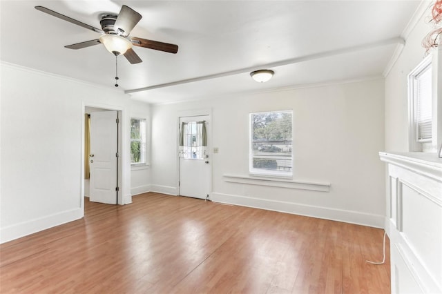 unfurnished room featuring ceiling fan, ornamental molding, and light hardwood / wood-style flooring