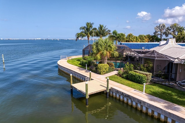 dock area featuring a water view and glass enclosure